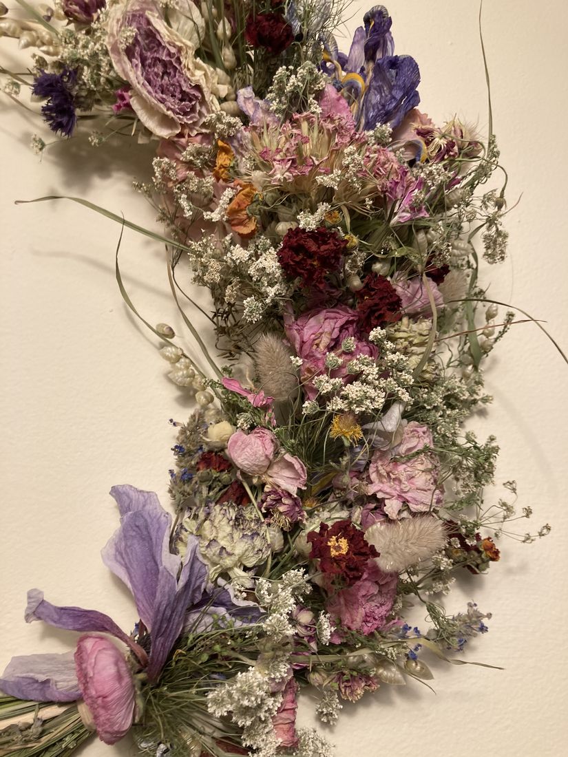 A dried flower arrangement with iris